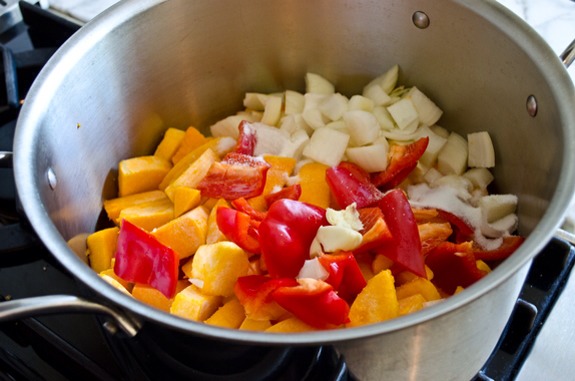 Begin by tossing all of the vegetables, salt and sugar in a large soup pot.