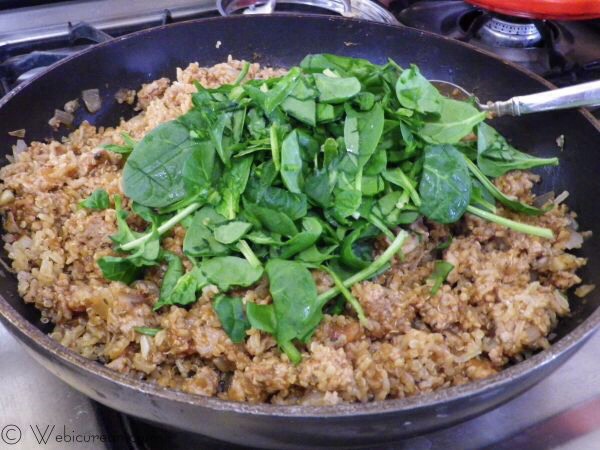 Turn off the heat and toss in the spinach. Be sure to chop it up better than I did.
