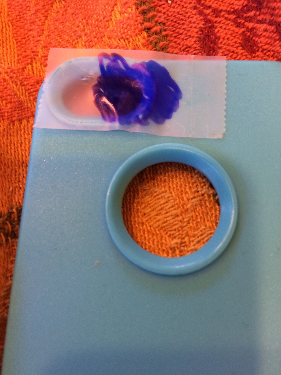 Tape over the light then color the tape blue. 