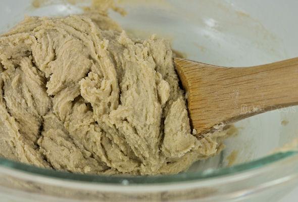 2. Slowly add in flour, salt and baking soda. Mix with a wooden spoon until well combined.