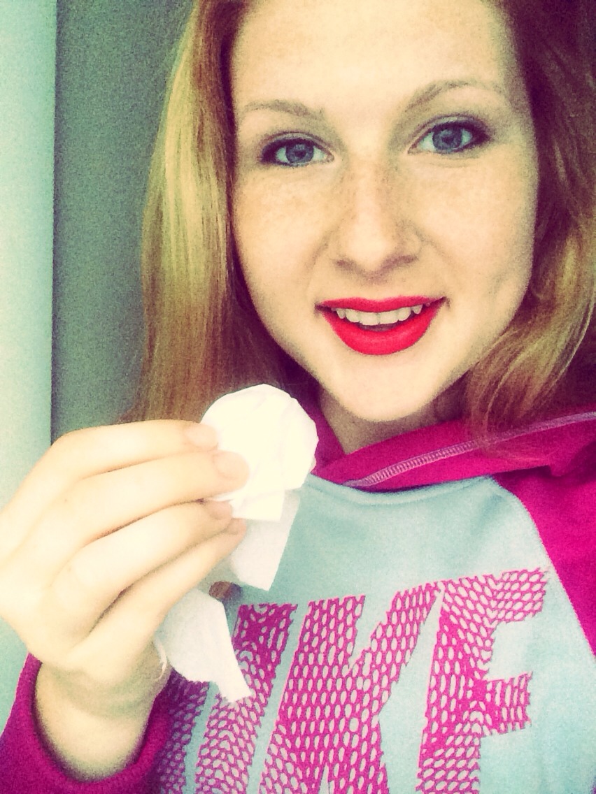 Once finished applying lipstick get a tissue 
