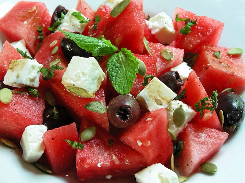 37. Watermelon-Feta Salad: Whisk 1 part white wine vinegar with 3 parts olive oil, and salt and pepper. Toss with baby arugula, red onion slices, watermelon cubes, crumbled feta, niçoise olives and fresh oregano.