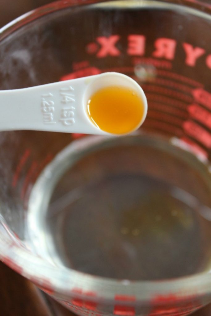 Poke holes into your vitamin e capsules + squeeze vitamin liquid into your oil while stirring