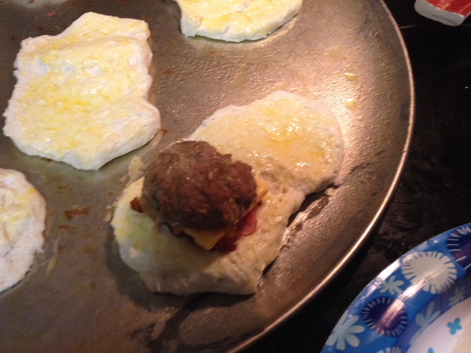 Top with a mini burger patty. 