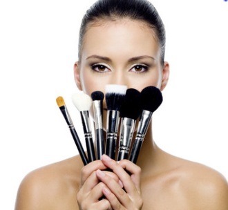 1. Begin by running your brushes under lukewarm water, rinsing out all of the residual makeup. Try to focus on the actual bristles while avoiding the part of the brush where handle meets the head, as this can loosen the glue over time.
