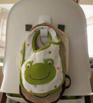Add a hook on back of high chair for storing bibs
