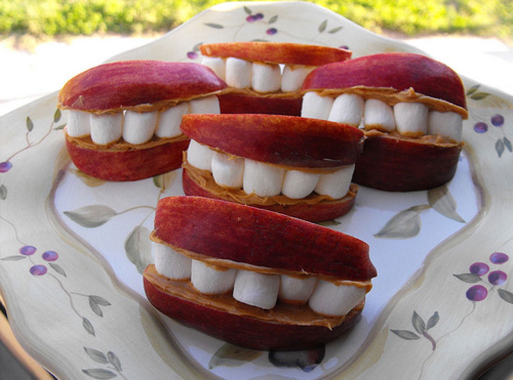 Cut up apple slices, spread peanut butter in them and then stick some mini marshmallows in between.