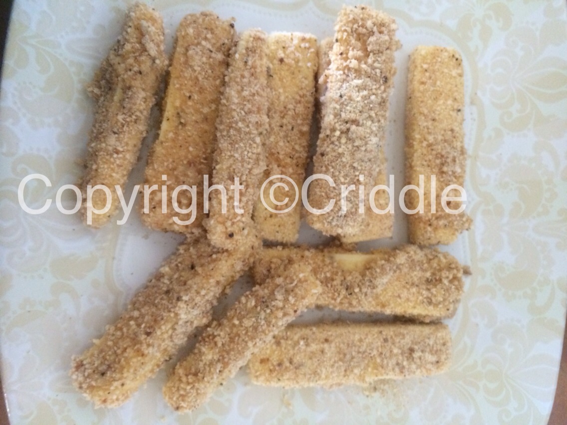 Dip the cheese into the egg then into the bread crumb mix and coat well