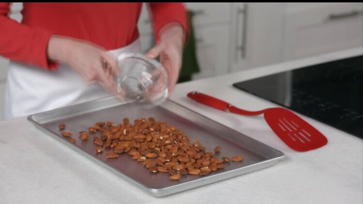 Ingredients
		Cake
		1 1/2 cups whole almonds, toasted (see Tip)
		4 large eggs, at room temperature (see Tip), separated
		1/2 cup honey
		1 teaspoon vanilla extract
		1/2 teaspoon baking soda
		1/2 teaspoon salt
		Topping
		2 tablespoons honey
		1/4 cup sliced almonds, toasted (see Tip)
