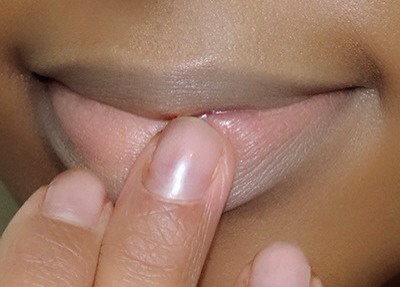 CONCEAL

Many people don't realize how important this step actually is when applying lipstick — especially when it's nude lipstick. Concealing your lips will give you a blank canvas, allowing the lipstick color show up true to tone. Just apply and blend out around the edge of your lips.