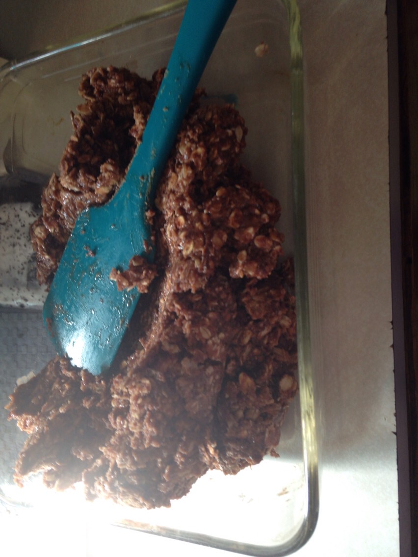 Add 3/4 cup water, be exact on how much water you add, your bars need to be thick, not too. Moist because they won't harden in the fridge 
  It's supposed to be hard to mix use your hands if a spoon doesn't work well