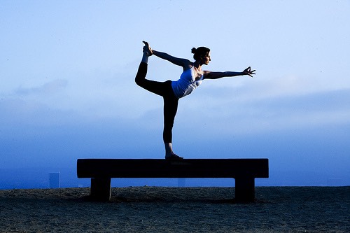 12. Natarajasana/Lord Of The Dance Pose
The Natarajasana combines strength, flexibility, and balance into one posture. Although it is a full body stretch, it is especially beneficial for your thigh and calf muscles.


