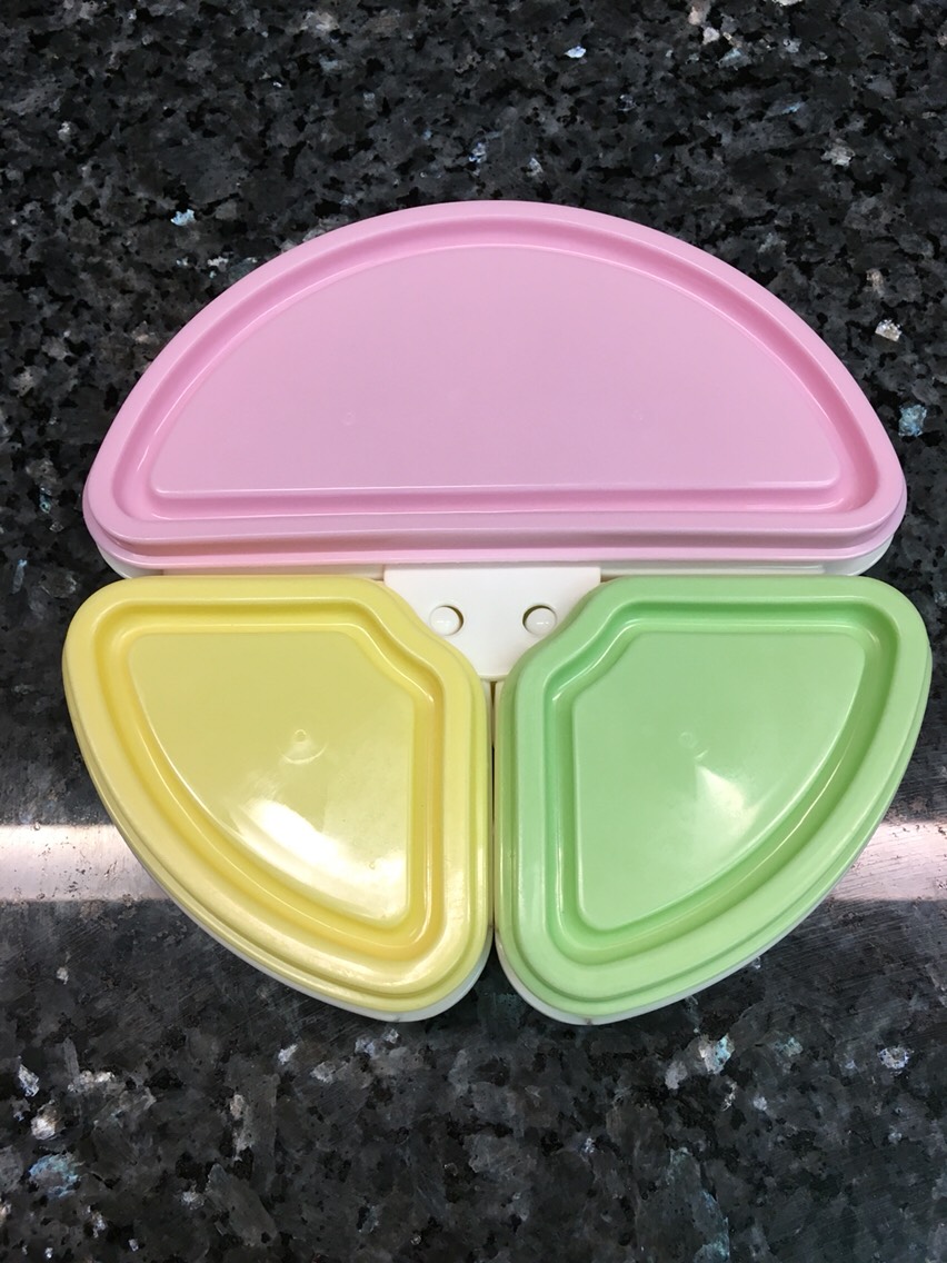 This plate made by MoMo Baby is awesome for travel! It comes apart to become 3 separate bowls for easy storage. I use mine for my toddler when flying in her diaper bag with fruit, veggies, crackers, even mini pb & j sandwiches.
I found this one on Amazon.