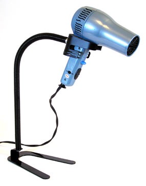 Drying your hair takes so much work. Get a hair dryer holder and make your life a thousand times easier.