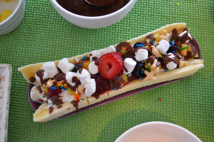 I then topped it with the warm marshmallows, sprinkles and dark chocolate drizzle. and cereal ( I used toddler cereal. LOL)