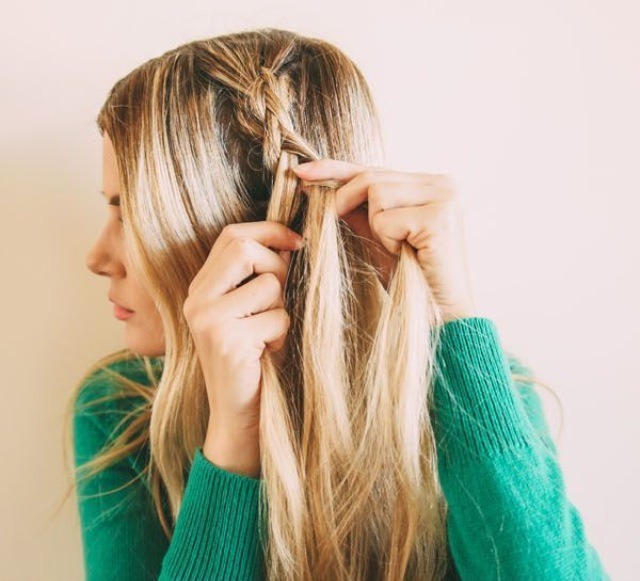 Braid a thick loose plait on one side of your hair roughly in the middle and secure with a small band.