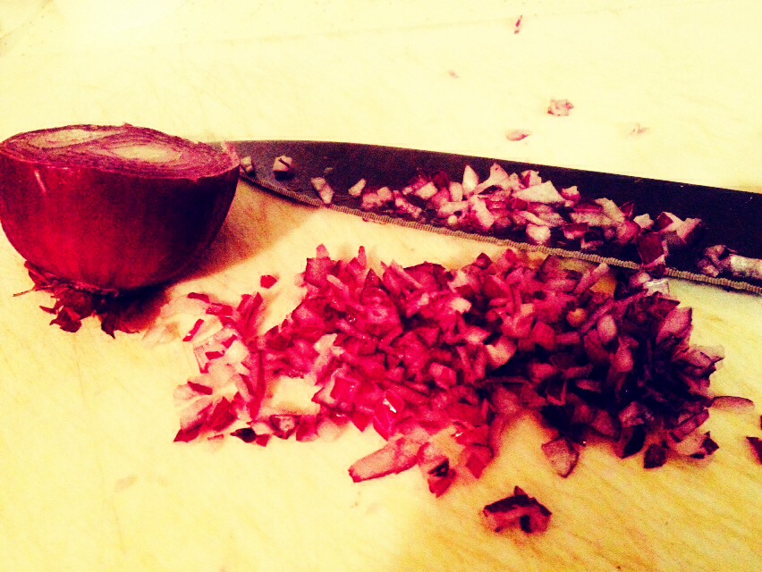 About 1/2 a small onion which ever you choose i prefer a white one.  Mince it up until its very small 