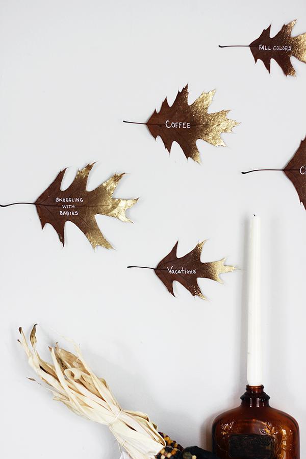 You could also go for a more simple display and tape the leaves to the wall with double sided tape or a fun washi tape across the stem. Let’s see what you come up with!
