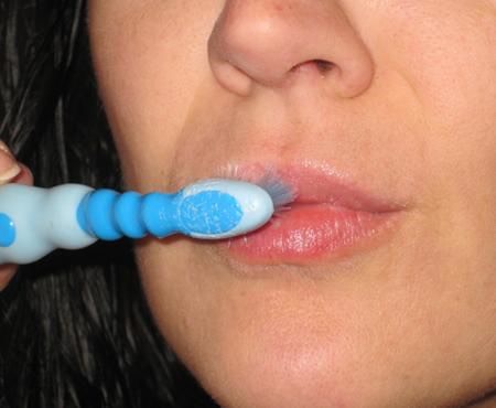 7. Lipstick Ready
Use a baby toothbrush to exfoliate your lips. To really get the job done, you can make a homemade lip exfoliate with sugar and coconut oil, or easier but not as effective, cover your lips in lip balm or petroleum jelly before scrubbing.
