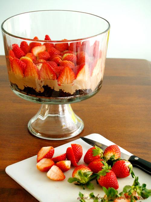 Cut up some strawberries and add a layer on top of the mousse.  For a nice presentation, cut up the straberries in half and place the cut side against the bowl.   - See more at: http://www.make-fabulous-cakes.com/nutella-mousse-chocolate-trifle.html#sthash.nipUNQoA.dpuf