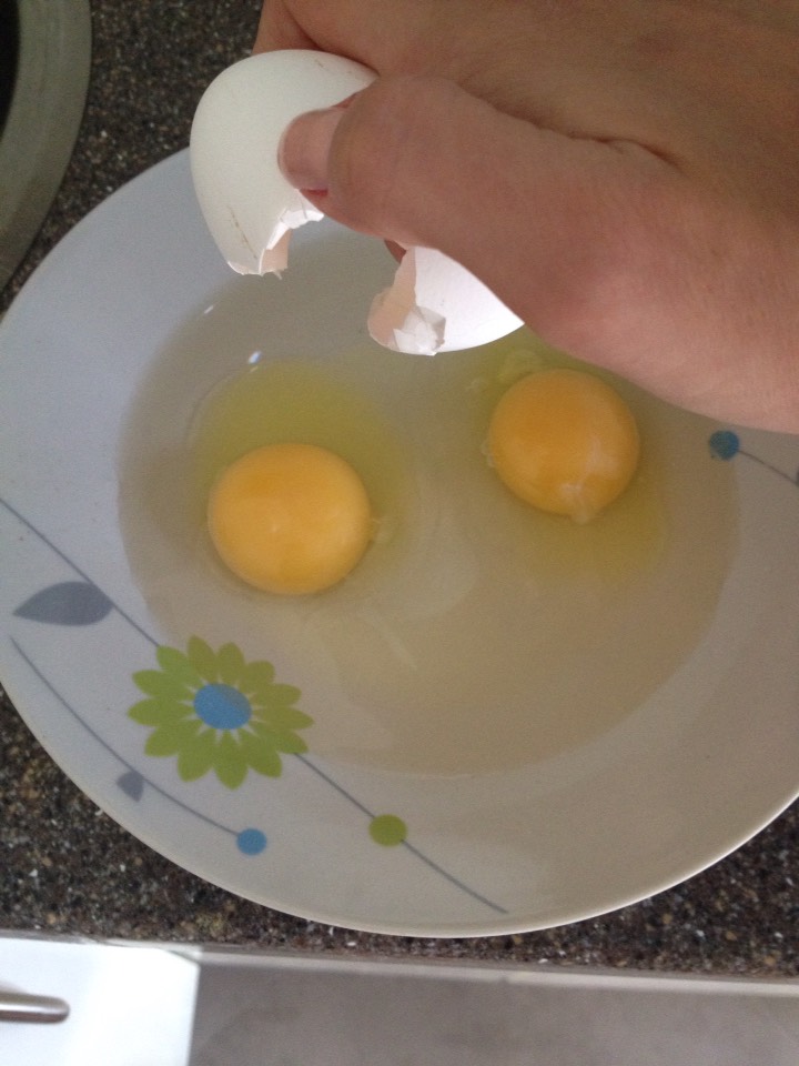 Crack two eggs (or one if you prefer) in the bowl, and DO NOT MIX!
