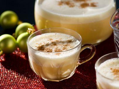 
Ingredients

8 eggs
1 can of condensed milk
3 to 4 canned peach halves or 8 to 10 canned peach slivers
1 teaspoon of vanilla extract
Two 8-oz. cups of rum (optional)
Cinnamon powder (or cinnamon stick for garnish)
