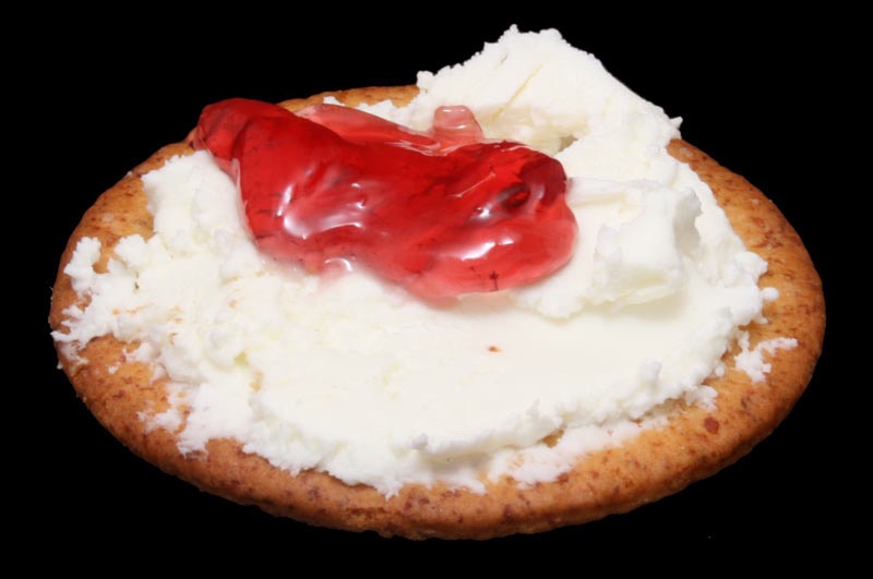 Think basic. A wedge of cheese with some fruit jam on the side makes a great appetizer, especially if you can pick up some crackers to go with it.
