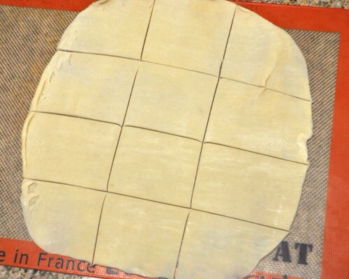 --> Take a pre-made pie crust or if you prefer homemade pie crust.
-> Roll it out a bit and then cut it into 12 square-ish like pieces.