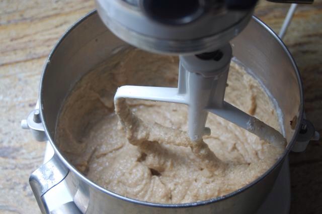 Preheat the oven to 350°F. Grease a 9-inch round springform pan pan. Dust the pan with flour and shake out the excess. 
Add the applesauce, sour cream, cinnamon, baking soda, nutmeg and salt to the butter-sugar mixture and beat on medium speed until blended.