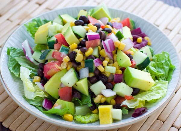 Black Bean, Corn and Avocado Salad

Avocados just scream summer, and this salad is full of them! Mixed with black beans, corn, and tomato, it's like an entire mexican dinner in one bowl. Margaritas, anyone?
