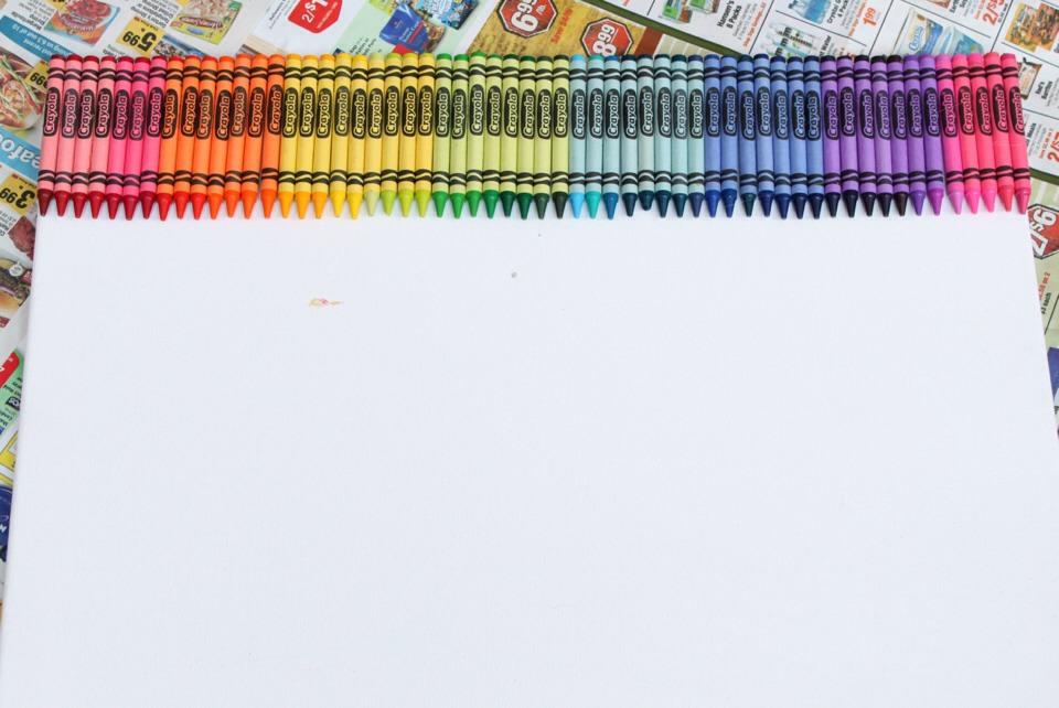 This is also another option to arrange your crayons. Once arranged, glue them to the board either by normal school glue or hot glue. 