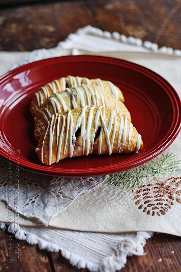 Cranberry Hand Pies With White Chocolate Drizzle 

Only 3 ingredients are needed to transform your leftover cranberry sauce into a dazzling dessert. 
http://amandascookin.com/2013/11/easy-cranberry-hand-pies-white-chocolate-drizzle.html