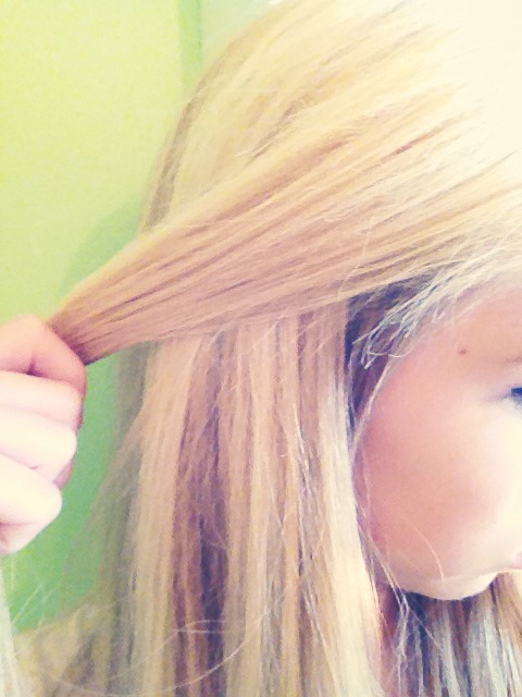 First, section off a part of your hair. 🌸