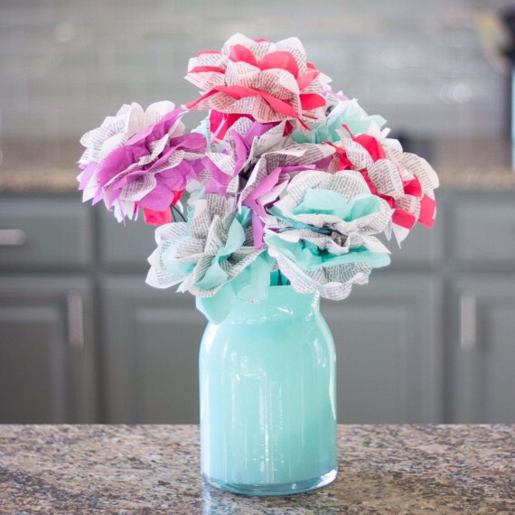 Encyclopedia Flowers
Floral bouquets are always welcome gifts, but they are short-lived. These paper flowers made from old encyclopedia pages and tissue paper are simple to make and will keep your friend smiling for a long time!