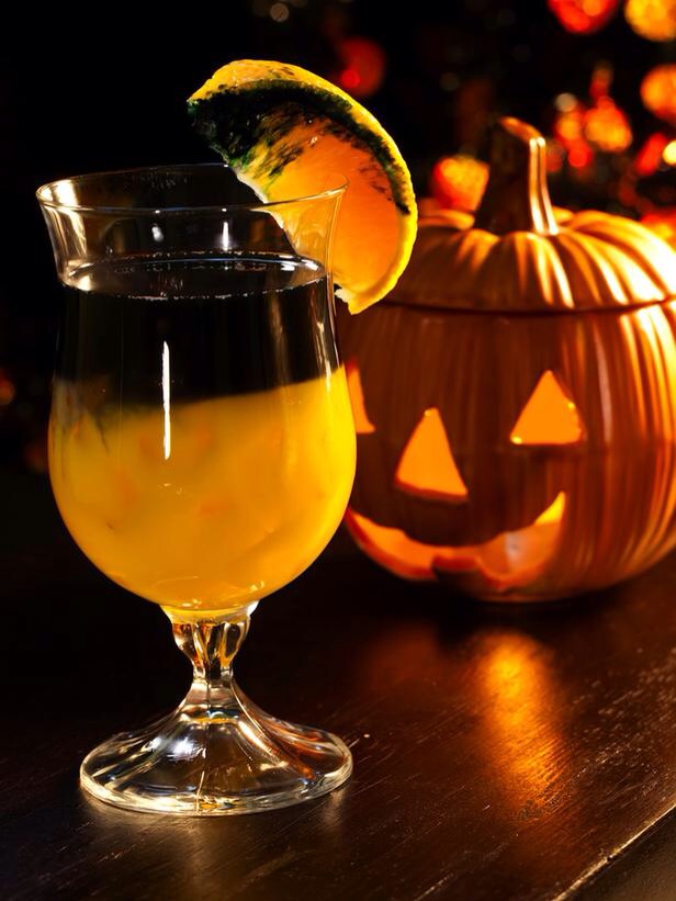 Black Magic Cocktail

Cast a spell over your Halloween party guests with this bewitching beverage that combines orange juice with black vodka and triple sec. 