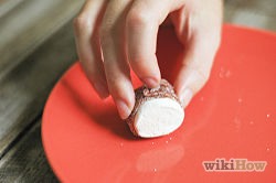 For Jelly Bean Sushi
Wrap a strip of the Fruit by the Foot around a marshmallow.