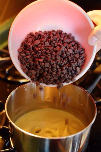 Remove from the heat and add the chocolate; allow it to gently melt.