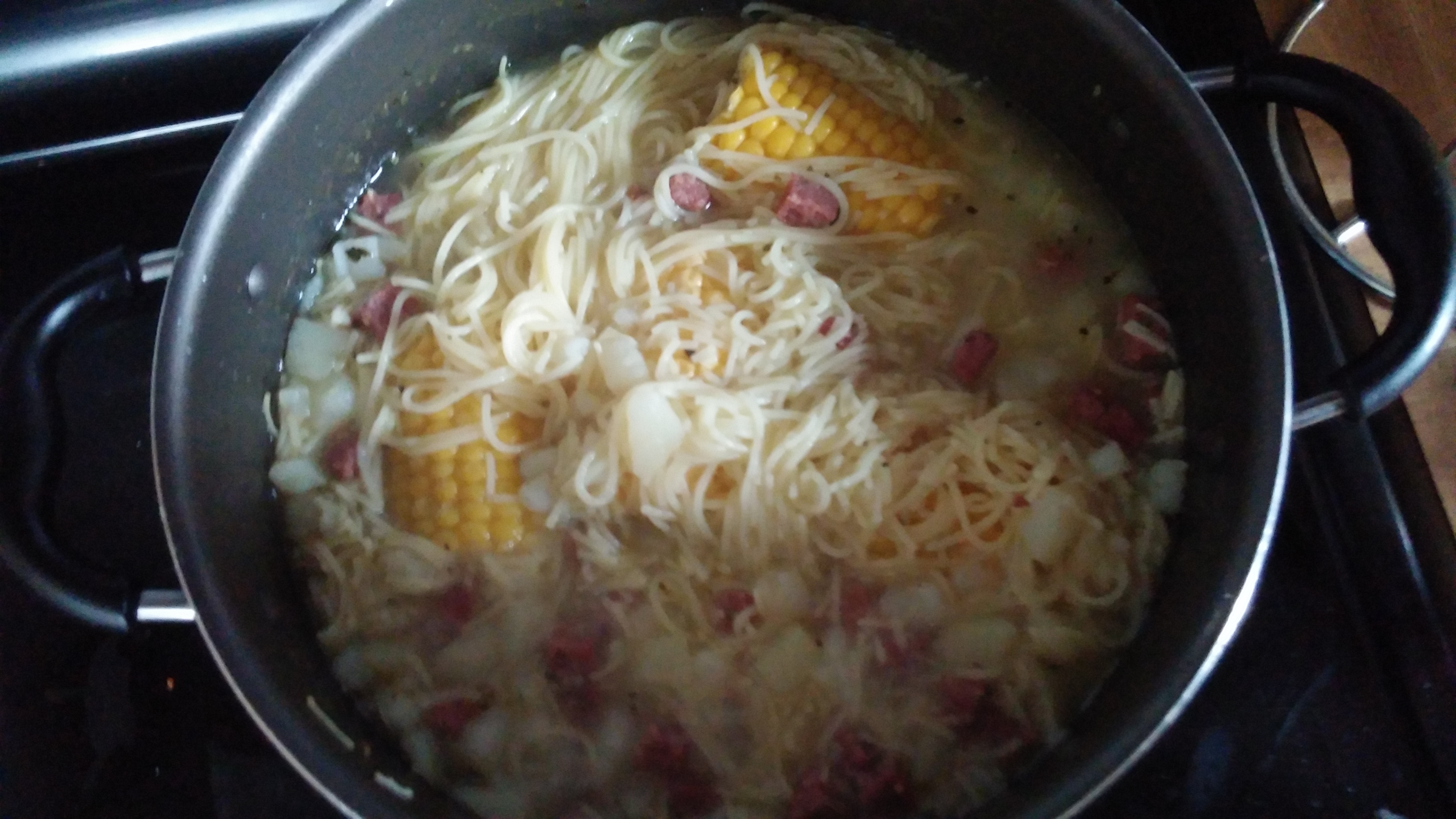 put all the ingredients together corn beef sausage potatoes and pasta soup bag and it will be all done 