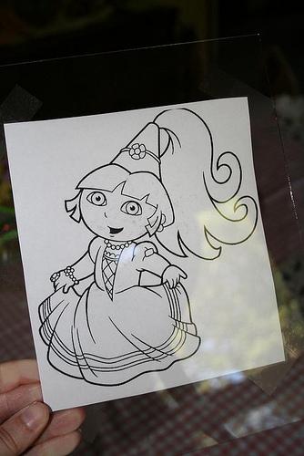 Print out a coloring page, and make sure it is the right size for the top of your cake. You need at least 1/2" space around the edge of your design on the cake. 

*your design will be reversed, so if you are doing a team logo or similar, you will want a mirror image of your original printout.* 
