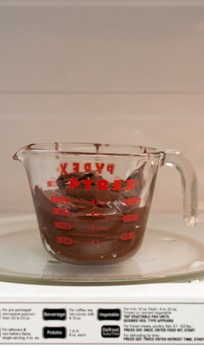 6. Microwave the Nutella for about 1 min, stopping every 15 sec to stir. The Nutella should be loose and creamy.