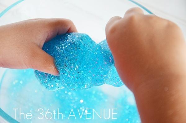 4. Then pour the Borax mixture inside of the bowl.

Combine the glue and the mixture together.

Right away you will see how the Glitter Slime will start to form.