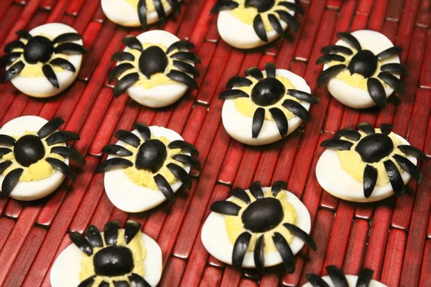Make a batch of deviled eggs. Then cut up a black olive to make the spider to top it off.