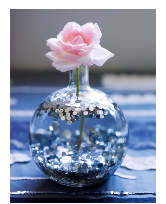 4. Have a sequin garment you don’t wear anymore? Remove the sequins and sprinkle them into a vase of flowers. Gorgeous!