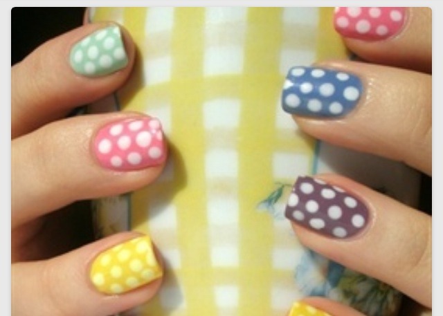 1. Paint your nails different colours 
2. Paint white dots on you nails
3. Simples, done, complete!