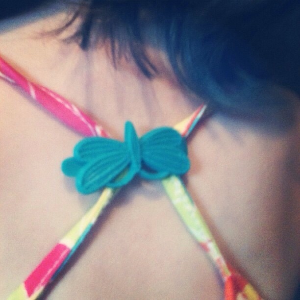 14. Use a barrette to fix your little girl’s too-loose tank top.