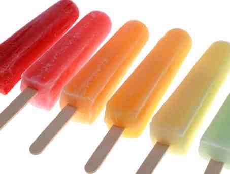 Cut a slit in a cupcake wrapper and slide it up the stick to allow for a mess free Popsicle