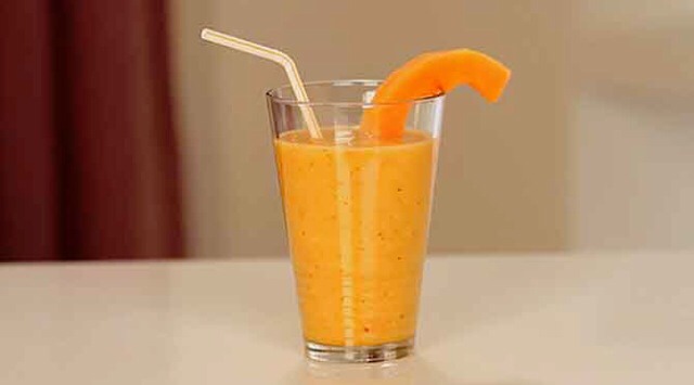 HAVE A TROPICAL SNACK 
Both pineapple and papaya contain enzymes — bromelain and papain, respectively — that help banish bloat by breaking down protein and easing digestion. Snack on a bowl of cut-up fruit, or make a papaya, pineapple, and coconut water smoothie for a midmorning snack!