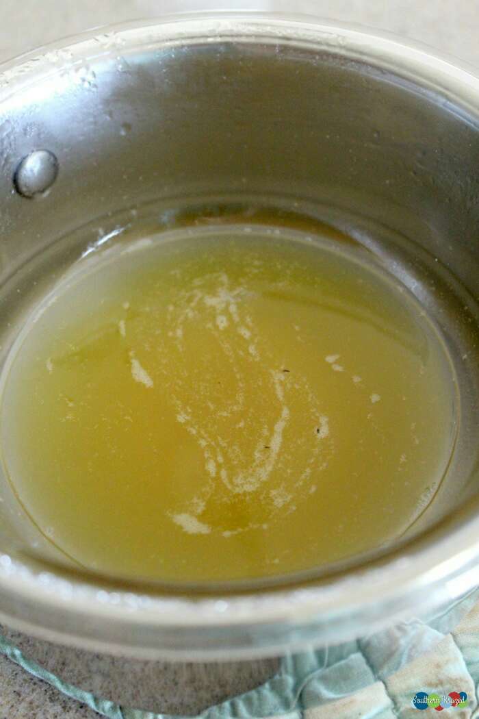 Add coconut oil, beeswax, and almond oil to your double boiler.