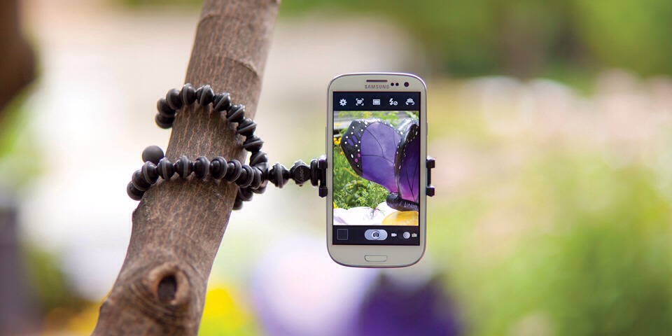 This crazy tripod is for holding your phone. You can attach it to your microwave handle for working out in the kitchen, prop it on a counter like a regular tripod, or on the ground.. Whatever! It's only $10 on amazon and the best money you'll spend! It's called a Gorilla Tripod