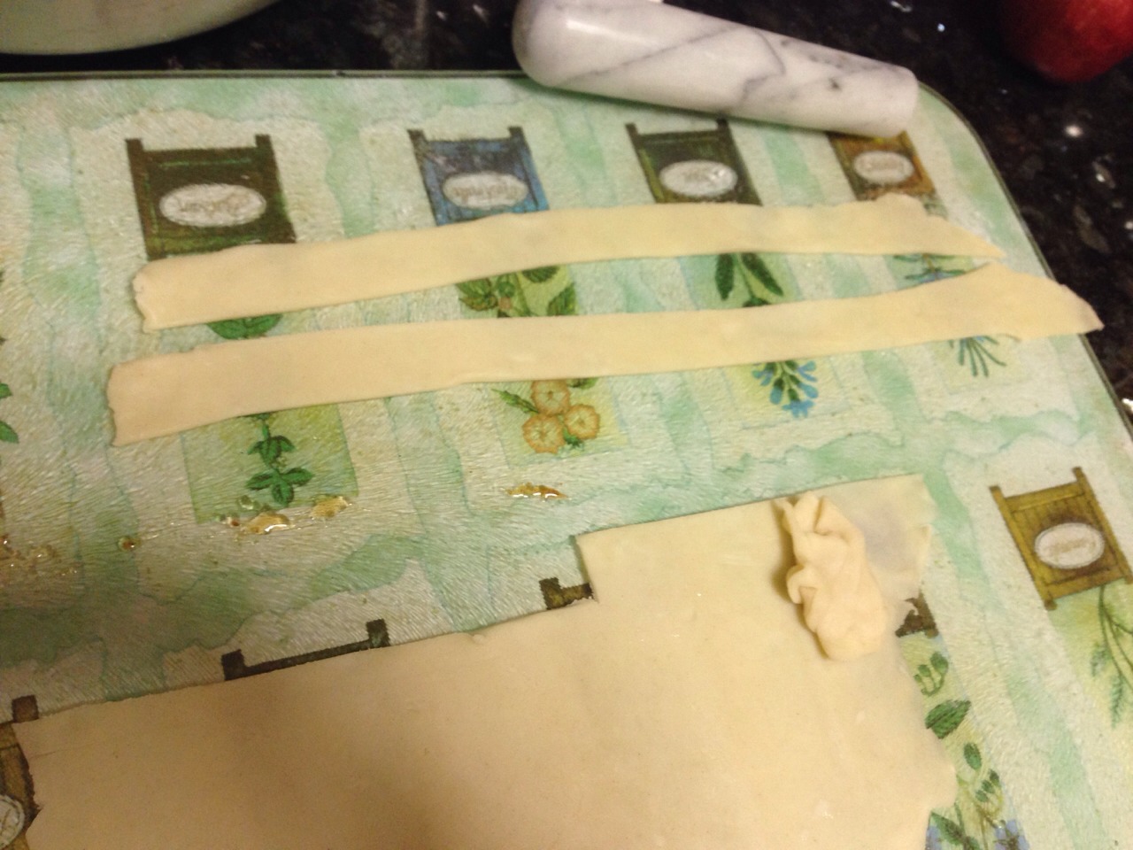 Roll out the pie dough and cut out 10-12 inch strips about an inch wide
